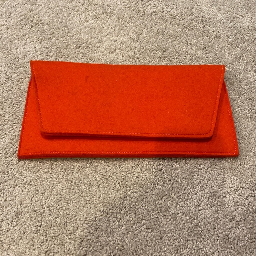 Bosom Buddy Bag, orange with pink in the pocket